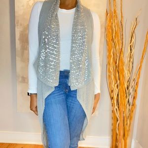 Gianni Bini silver long sleeveless cardigan.